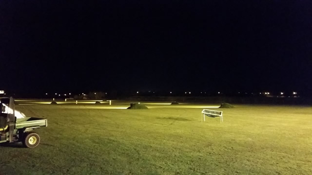 Golf driving range lighting in operation