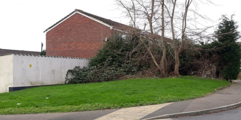 Pair of dwelling allowed on underused garage site and grassed area in Somerset