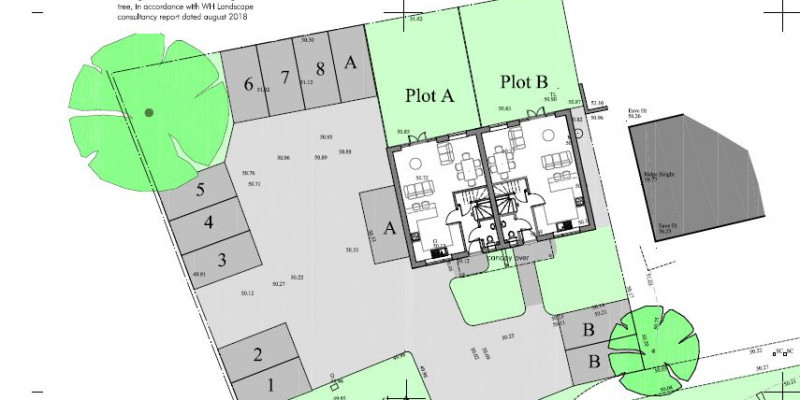 Pair of dwellings allowed on garage site